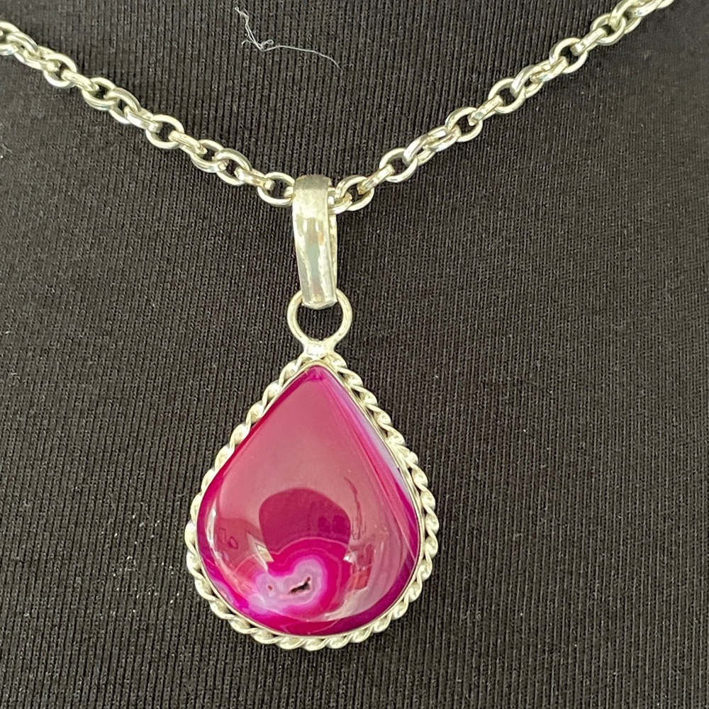 Pink Agate set in a Pear shaped Sterling setting on a 30” silver tone chain.